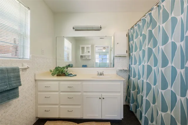 a view of an empty room with stairs