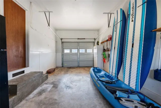 a view of yard with swimming pool and sitting area