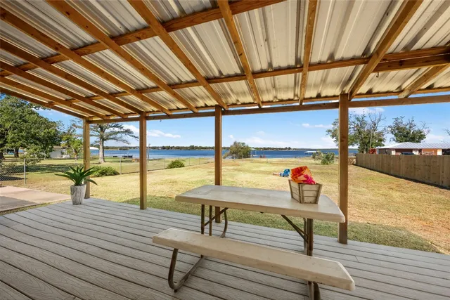 a view of a lake with outdoor space