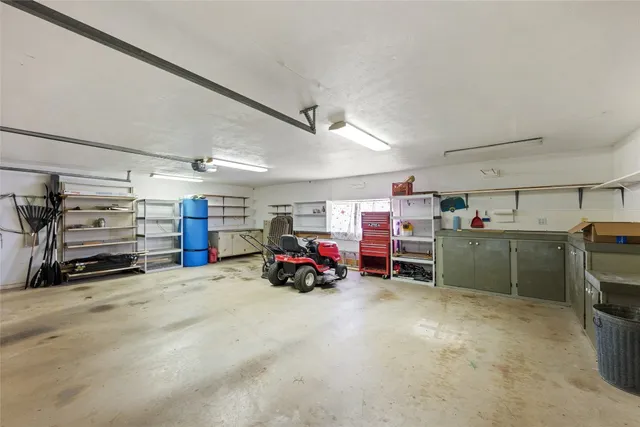 a kitchen with a stove and a refrigerator