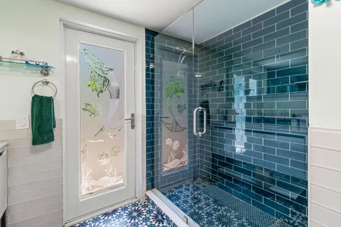 a view of a hallway with washer and dryer