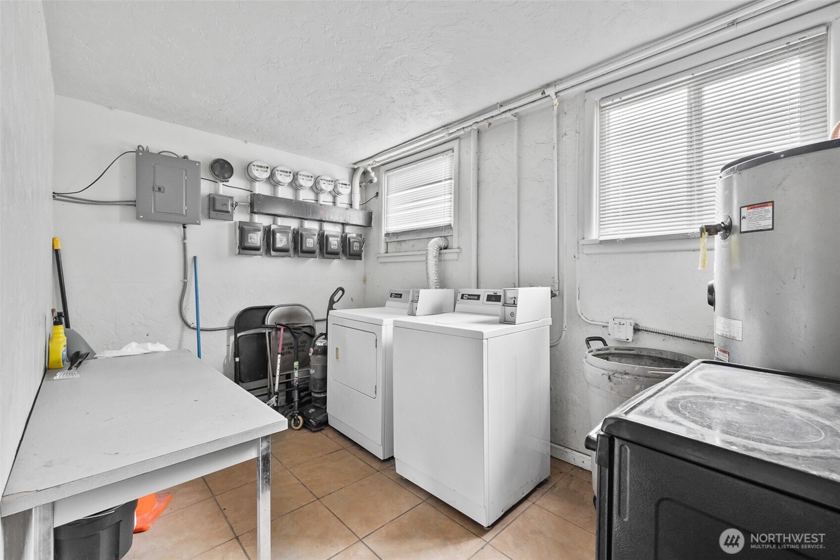 1304 West Hopkins Street Pasco, WA 99301 - Photo 12 of 12 a view of a kitchen with appliances and furniture
