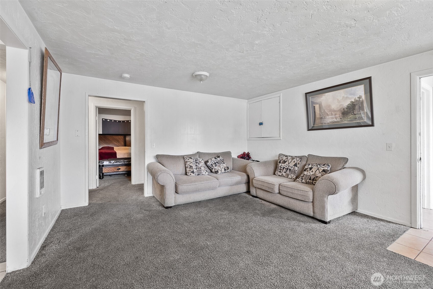 1304 West Hopkins Street Pasco, WA 99301 - Photo 8 of 12 a living room with furniture and a lamp