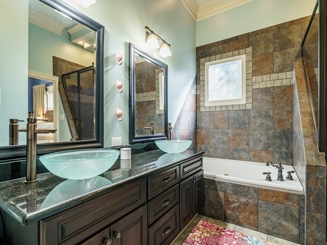 518 East Lane Street Raleigh, NC 27601 - Photo 9 of 29 Simply stunning! That is a Jacuzzi tub.