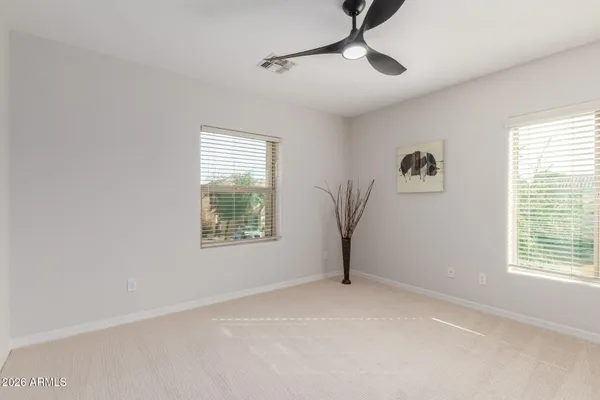 a kitchen with a refrigerator and a sink