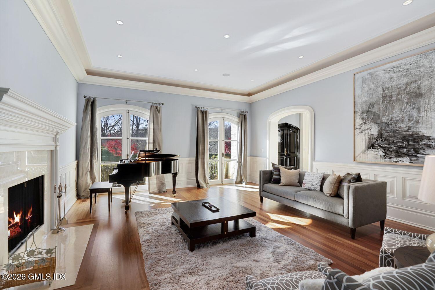 44 Hunting Ridge Road Greenwich, CT 06831 - Photo 9 of 30 a living room with furniture and a fireplace