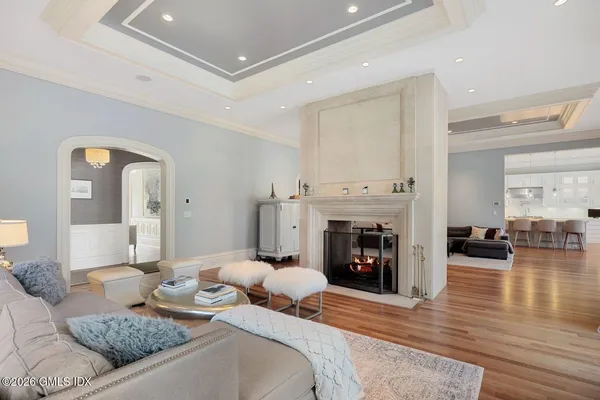 a bedroom with furniture and a fireplace