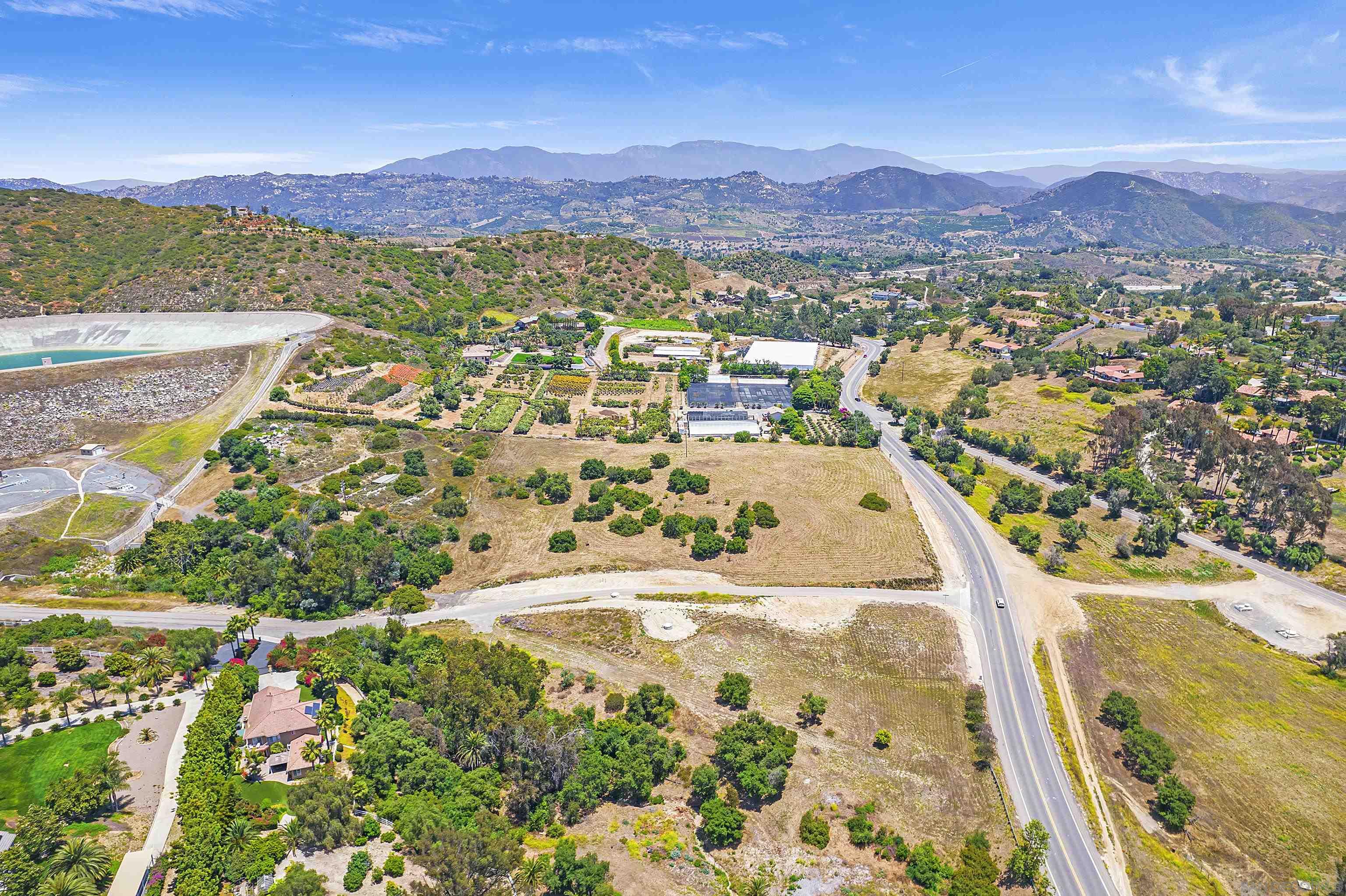 0 Mission Road, Unit NONE Fallbrook, CA 92028 - Photo 3 of 5 a view of a city with a lake