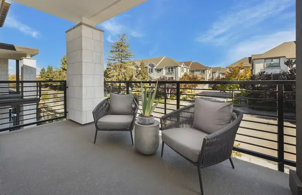 a view of a terrace with furniture