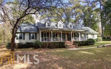 458 Old Post Road Mansfield, GA 30055 - Photo 1 of 1 a front view of a house with garden