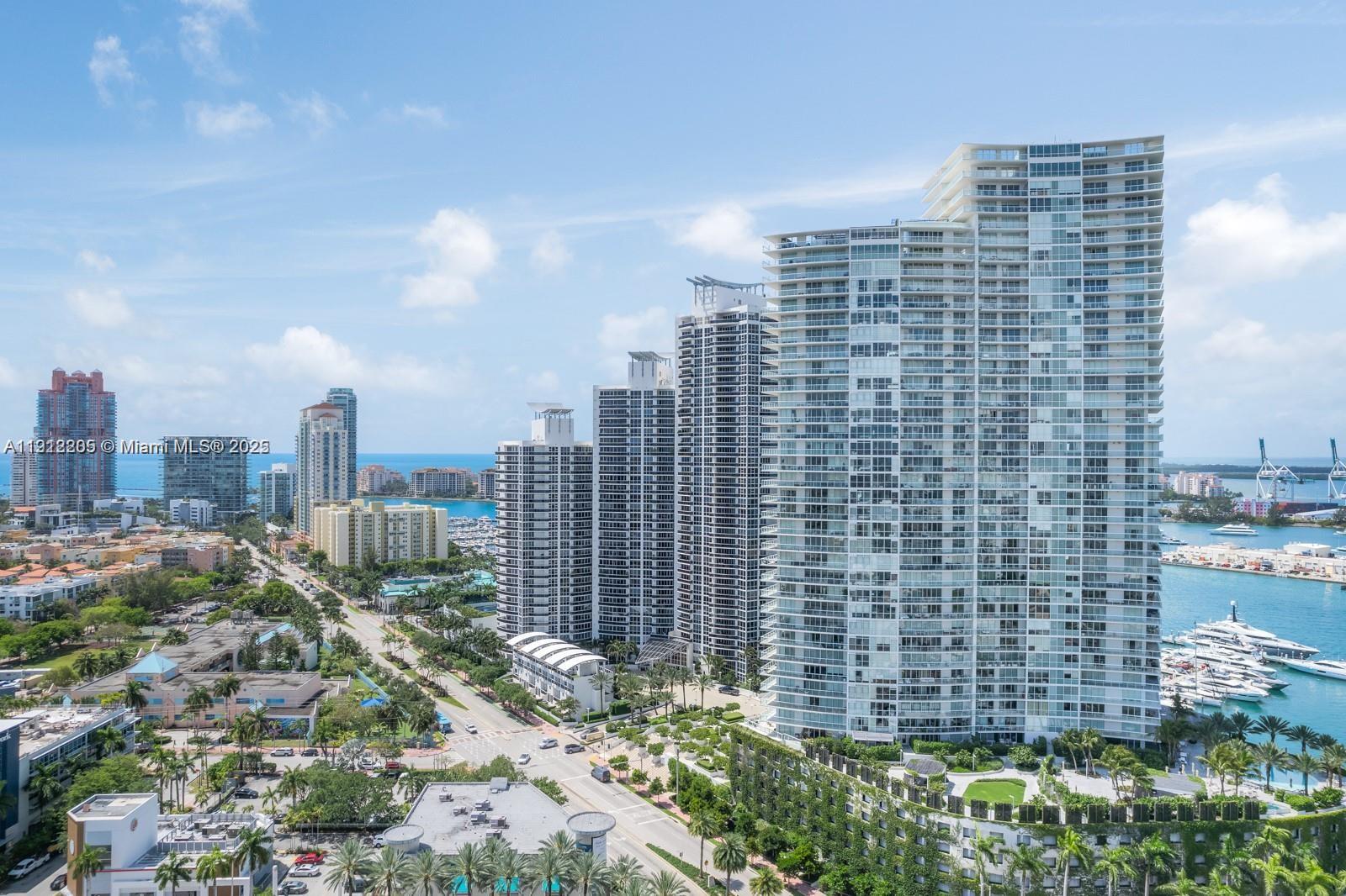 450 Alton Road, Unit 3303 Miami Beach, FL 33139 - Photo 20 of 35 a view of a city with tall buildings