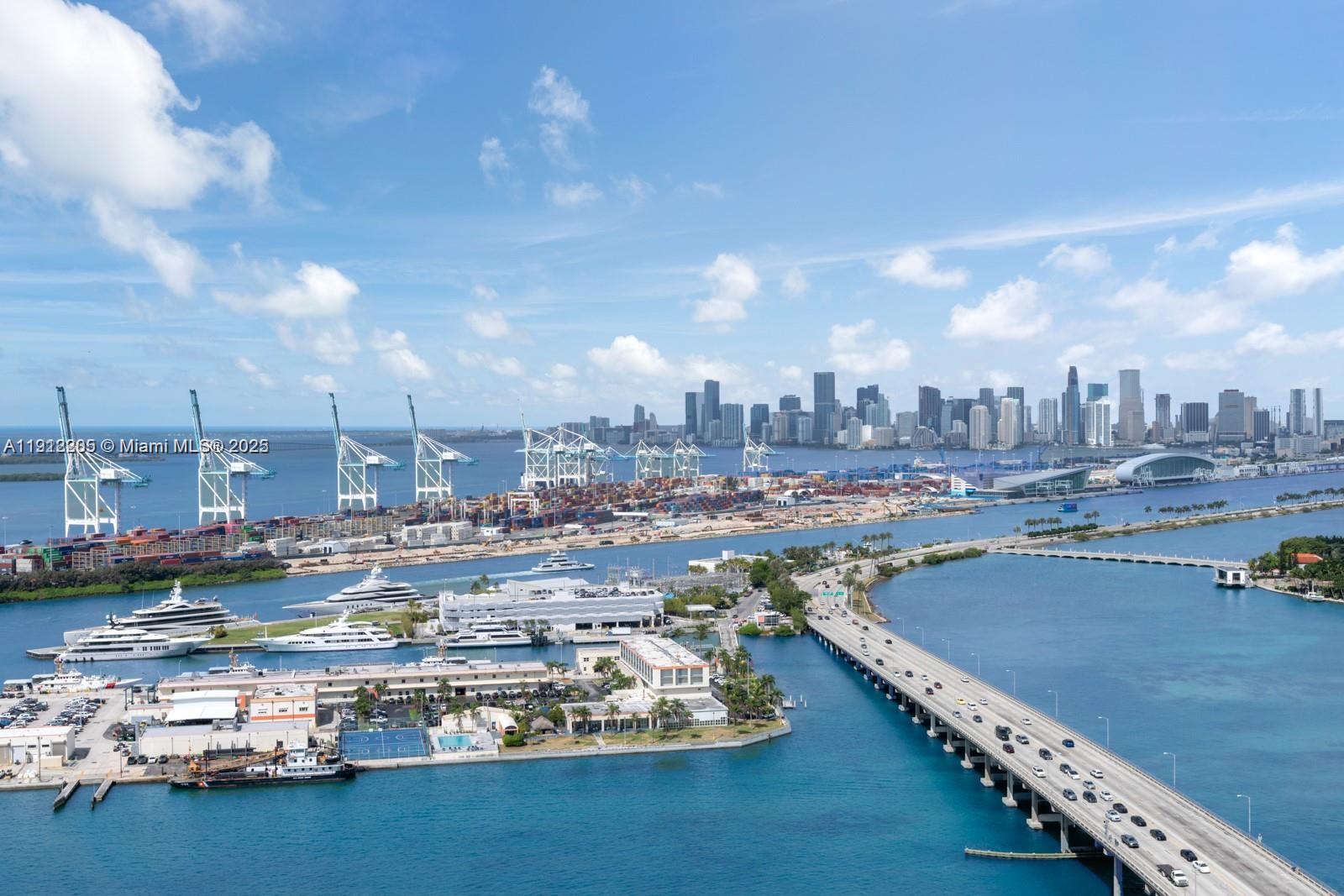 450 Alton Road, Unit 3303 Miami Beach, FL 33139 - Photo 27 of 35 a city view with tall buildings