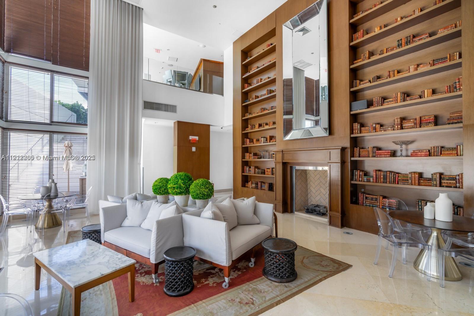 450 Alton Road, Unit 3303 Miami Beach, FL 33139 - Photo 29 of 35 a living room with furniture and a potted plant