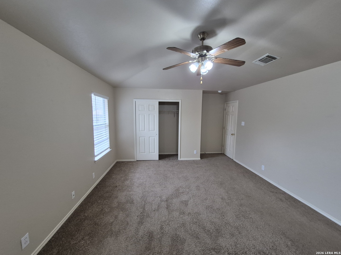 3338 Whisper Manor Schertz, TX 78108 - Photo 12 of 40 a view of an empty room with a window
