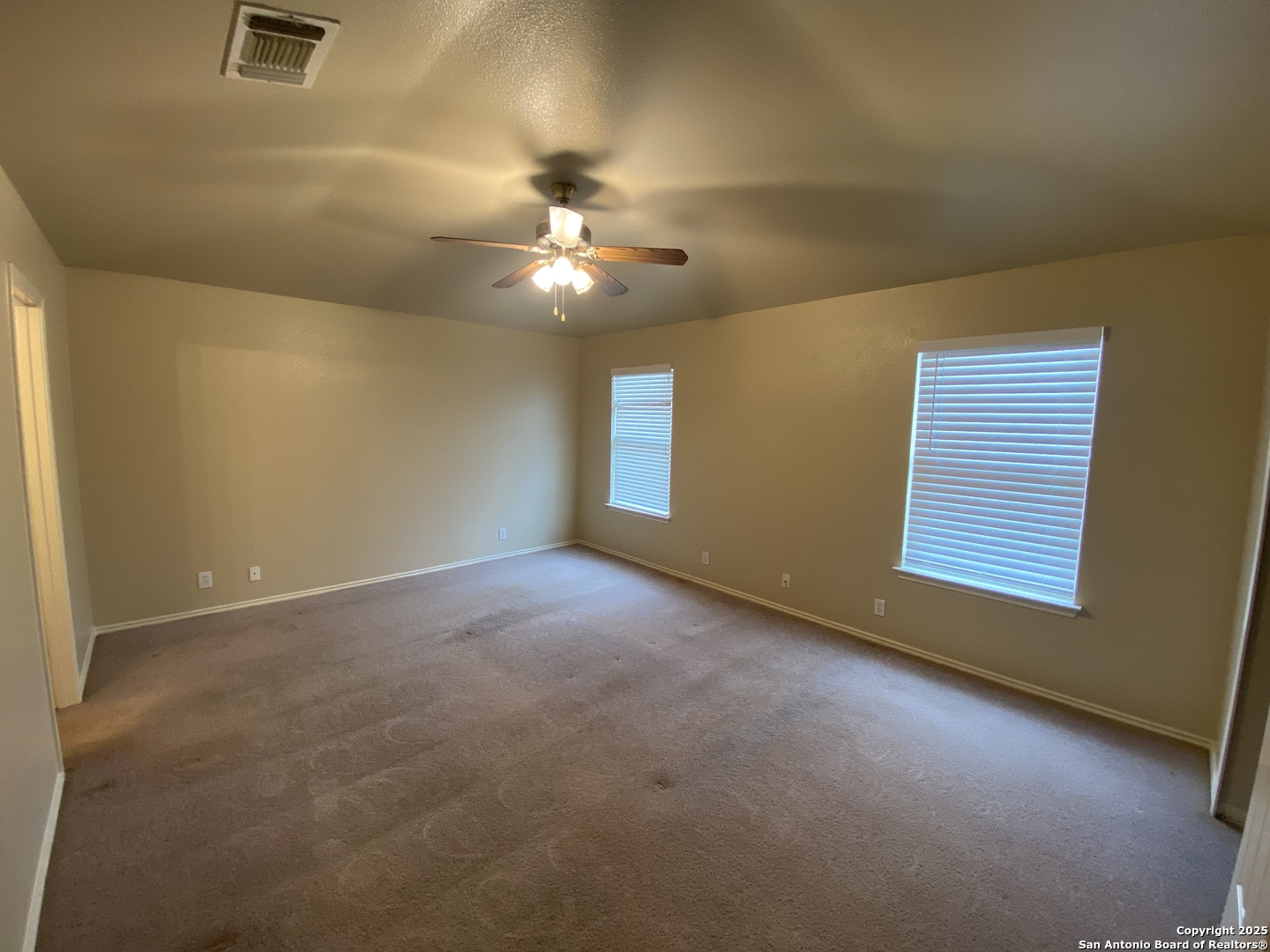 3338 Whisper Manor Schertz, TX 78108 - Photo 14 of 45 a view of an empty room with a window