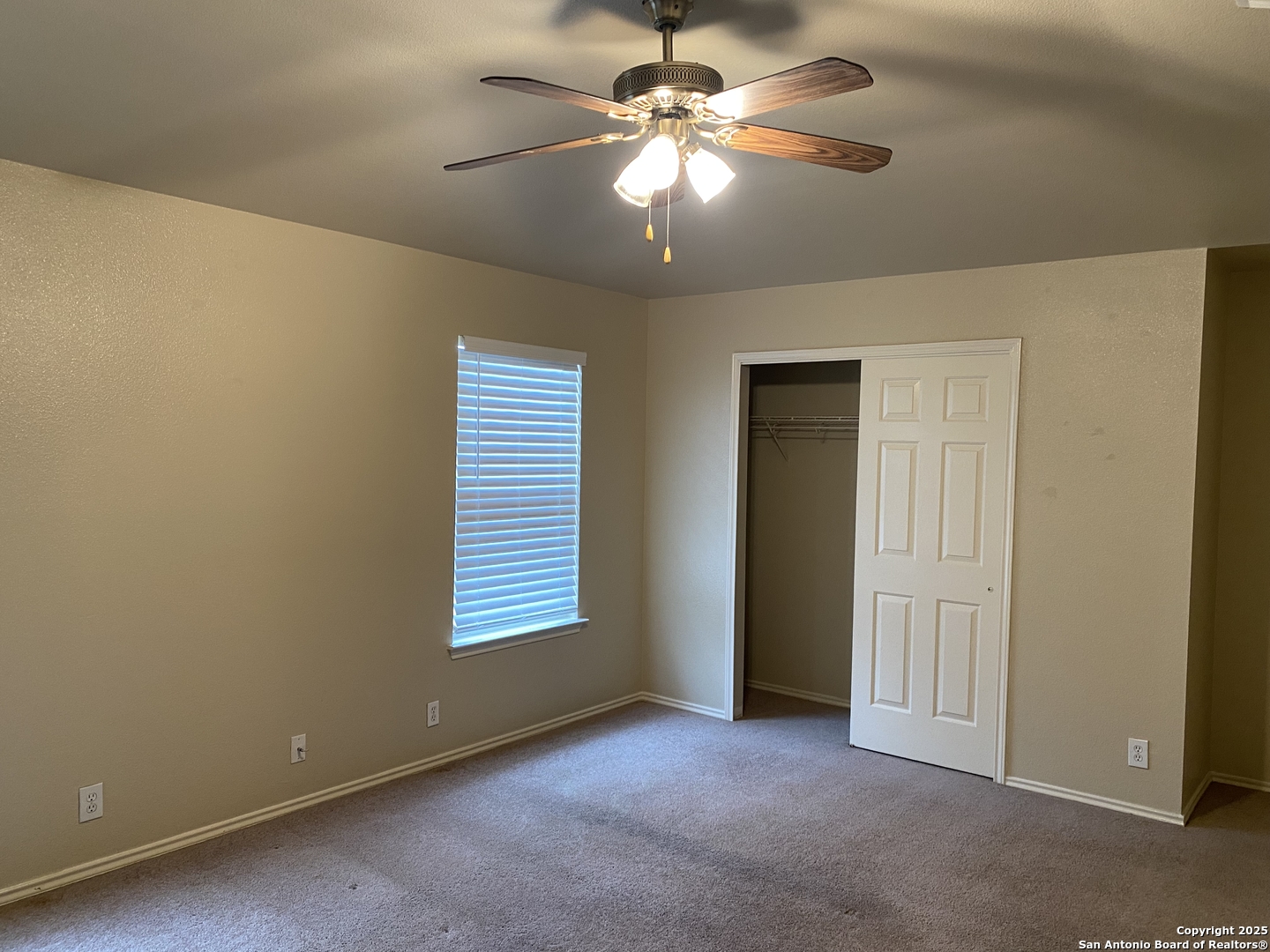 3338 Whisper Manor Schertz, TX 78108 - Photo 16 of 45 an empty room with windows and fan
