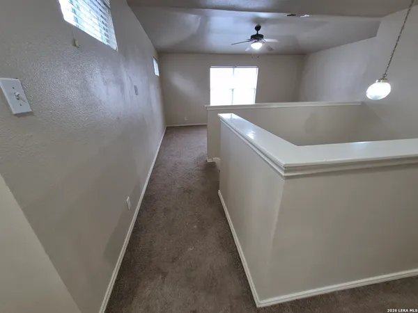 a view of a hallway with entryway