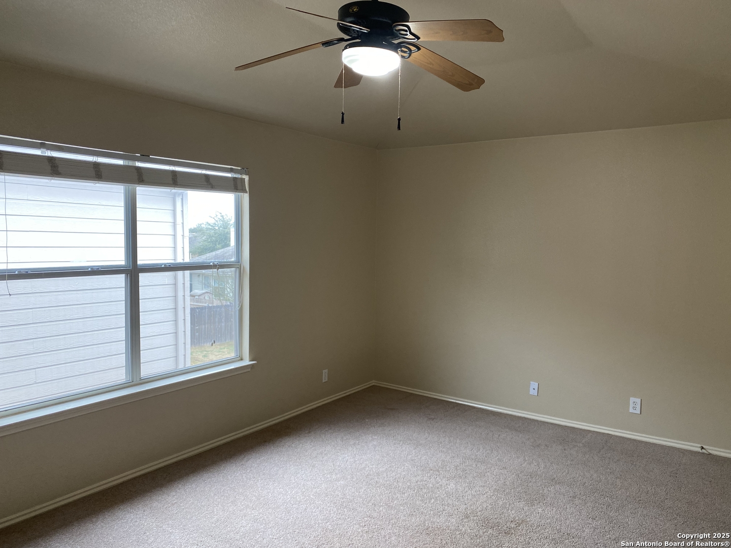 3338 Whisper Manor Schertz, TX 78108 - Photo 24 of 45 a view of an empty room with a window