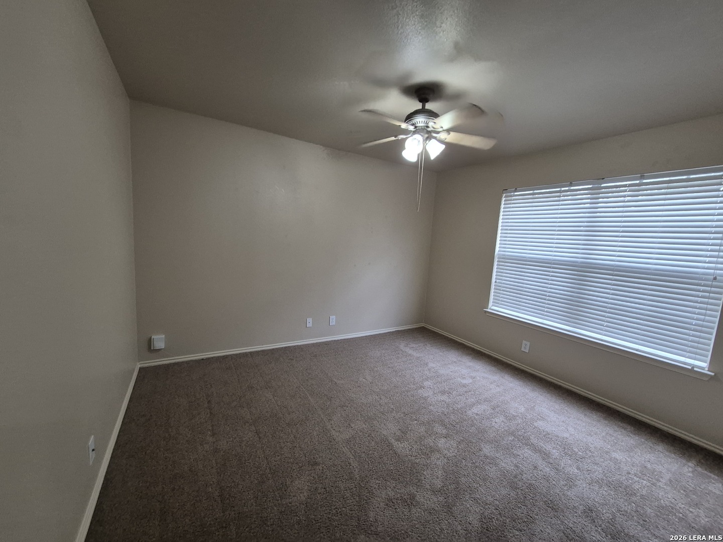 3338 Whisper Manor Schertz, TX 78108 - Photo 26 of 40 a view of an empty room with a window