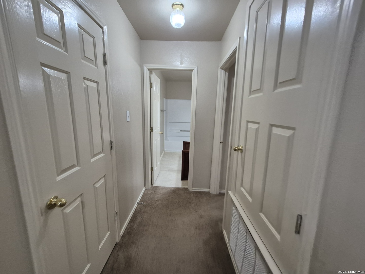 3338 Whisper Manor Schertz, TX 78108 - Photo 33 of 40 a view of a hallway with wooden floor and closet