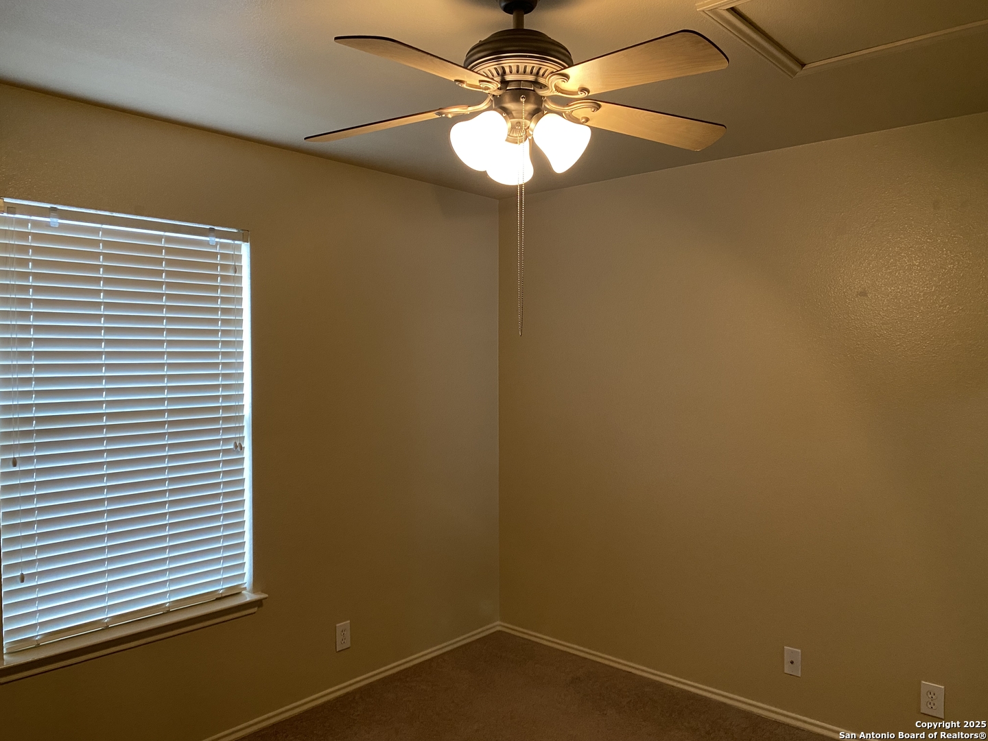 3338 Whisper Manor Schertz, TX 78108 - Photo 35 of 45 a view of a room with a chandelier fan