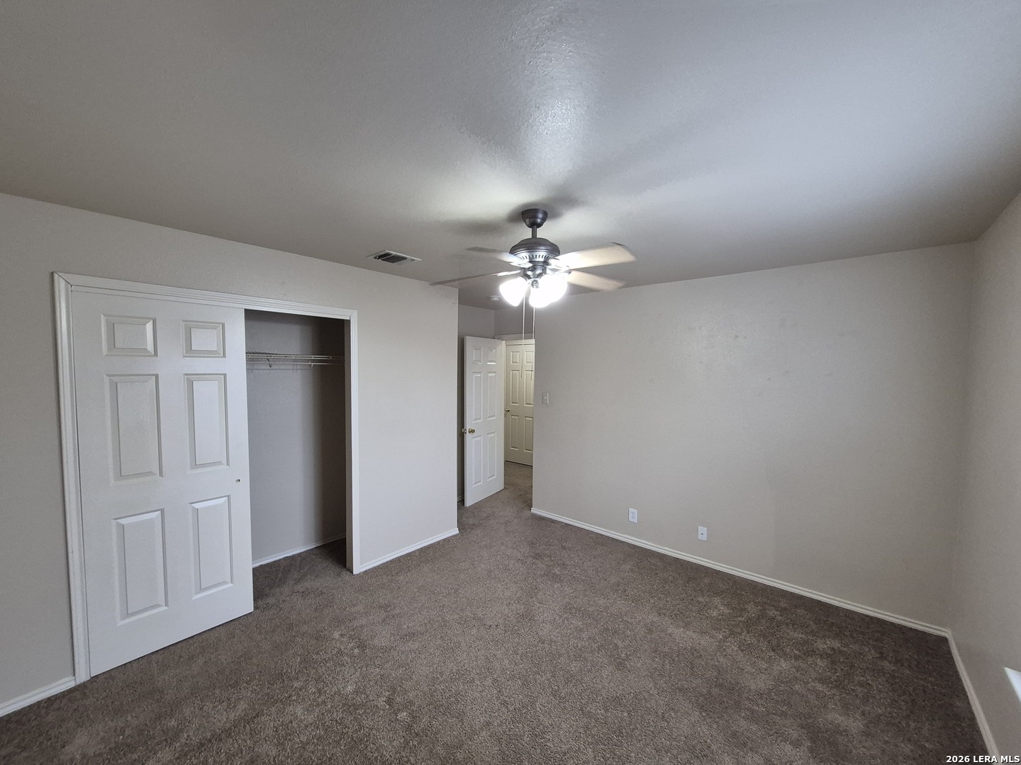3338 Whisper Manor Schertz, TX 78108 - Photo 36 of 40 a view of an empty room with a fan