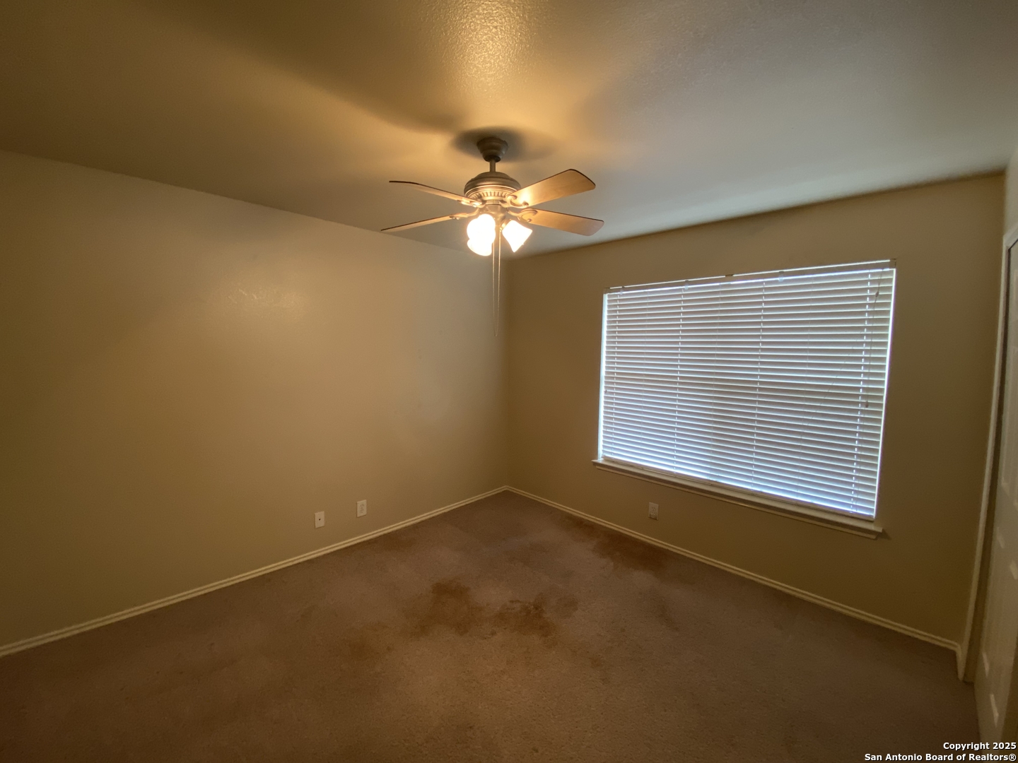 3338 Whisper Manor Schertz, TX 78108 - Photo 38 of 45 a view of an empty room with a window