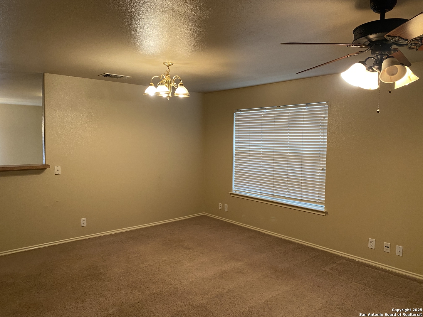 3338 Whisper Manor Schertz, TX 78108 - Photo 4 of 45 a view of a livingroom with a window