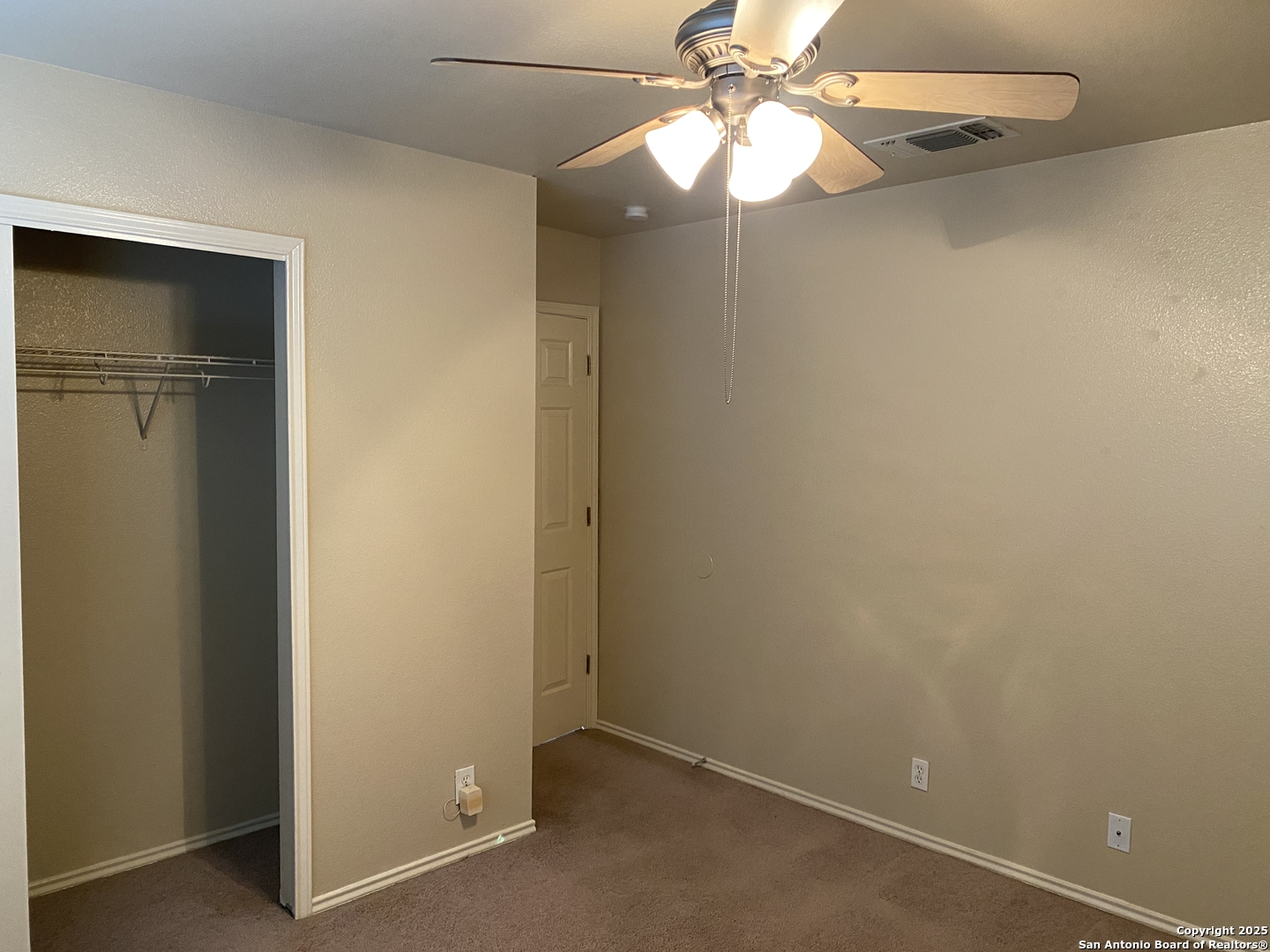 3338 Whisper Manor Schertz, TX 78108 - Photo 41 of 45 an empty room with a fan