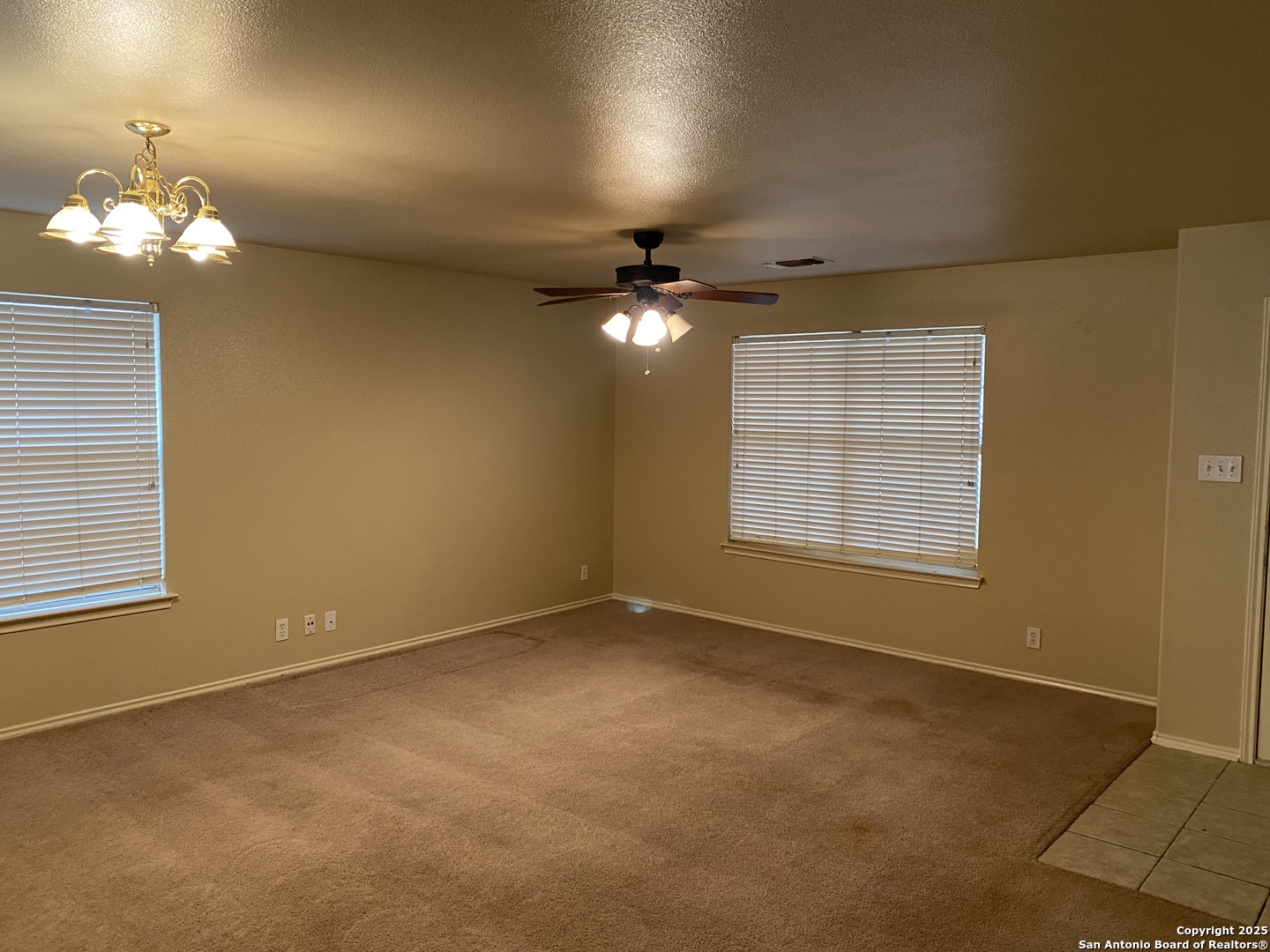 3338 Whisper Manor Schertz, TX 78108 - Photo 5 of 45 a view of an empty room with a window