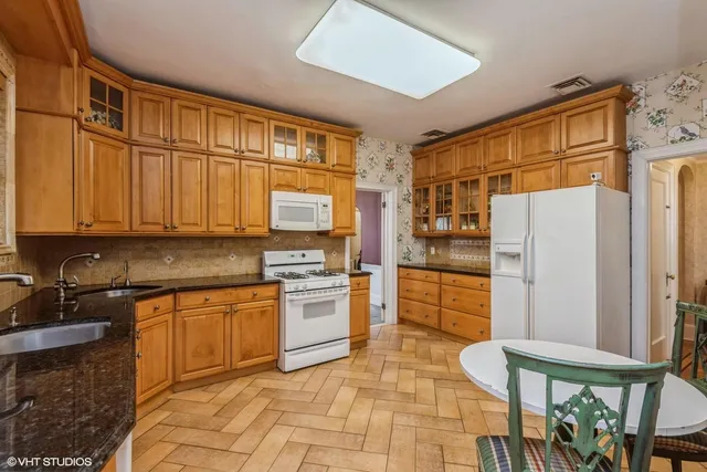 a view of a livingroom with furniture and wooden floor