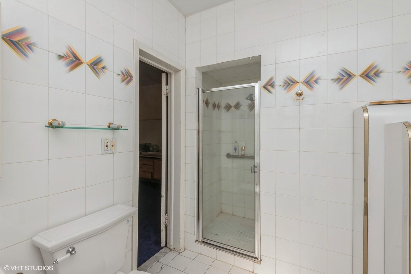 130 Hards Lane Lawrence, NY 11559 - Photo 28 of 36 a bathroom with a shower