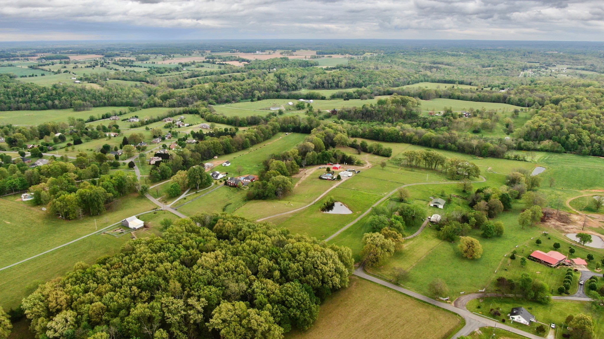 326 Ranch Road Portland, TN 37148 - Photo 24 of 30 a view of a garden with a houses