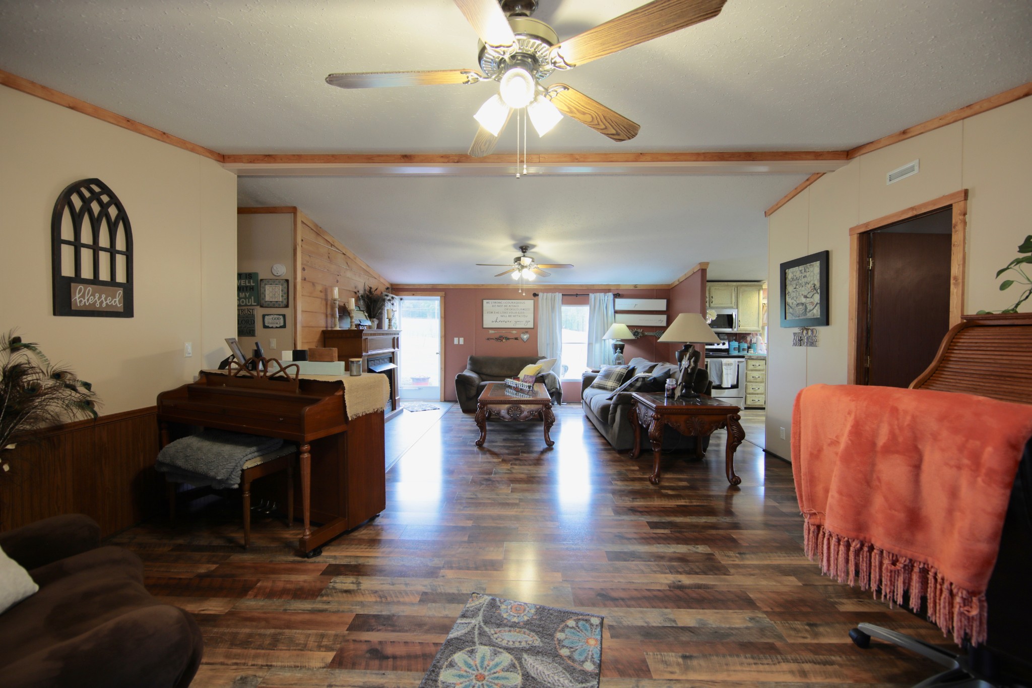 326 Ranch Road Portland, TN 37148 - Photo 3 of 30 a living room with furniture and a chandelier