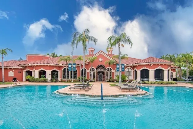 a view of outdoor space with swimming pool and patio