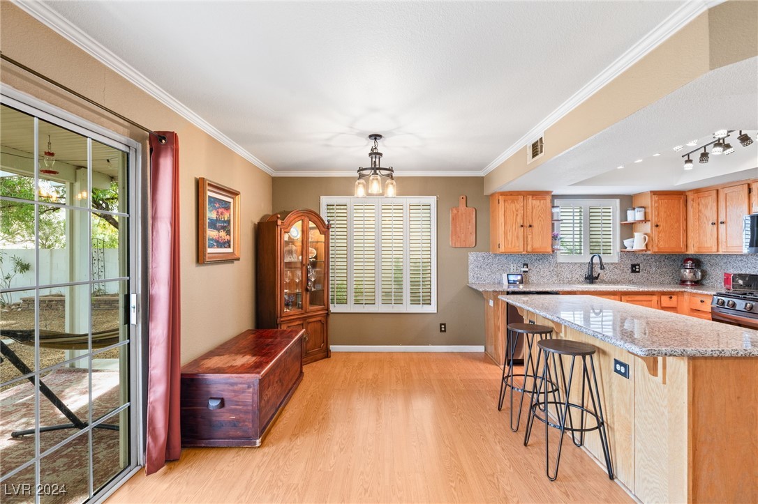 2316 Loggerhead Road Las Vegas, NV 89117 - Photo 16 of 35 View From Family Room of Dining Area and KiTchen Island