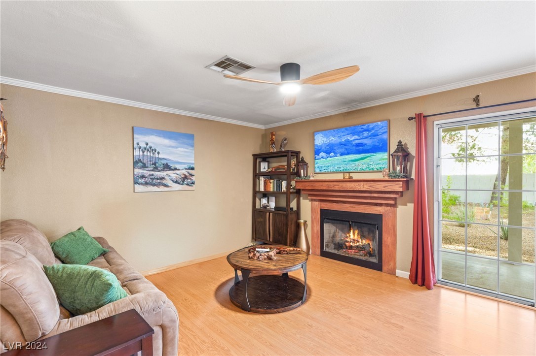 2316 Loggerhead Road Las Vegas, NV 89117 - Photo 17 of 35 Family Room Has A Cozy Fireplace