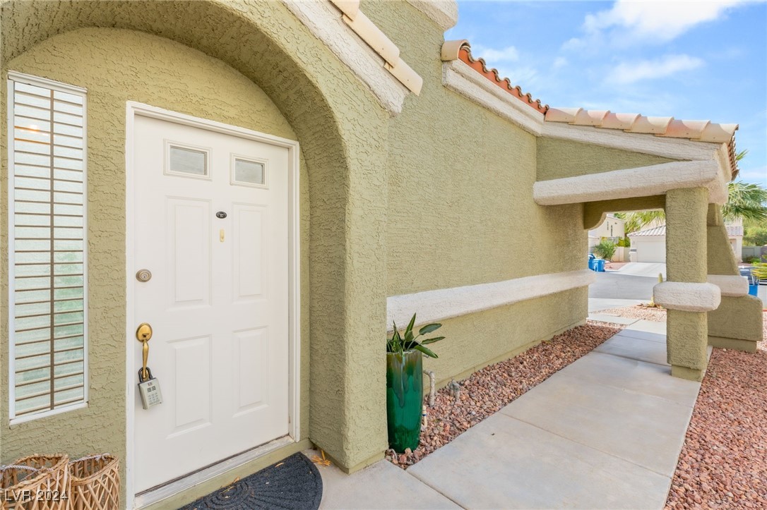 2316 Loggerhead Road Las Vegas, NV 89117 - Photo 4 of 35 Front Door is Accessible from Side of the Home