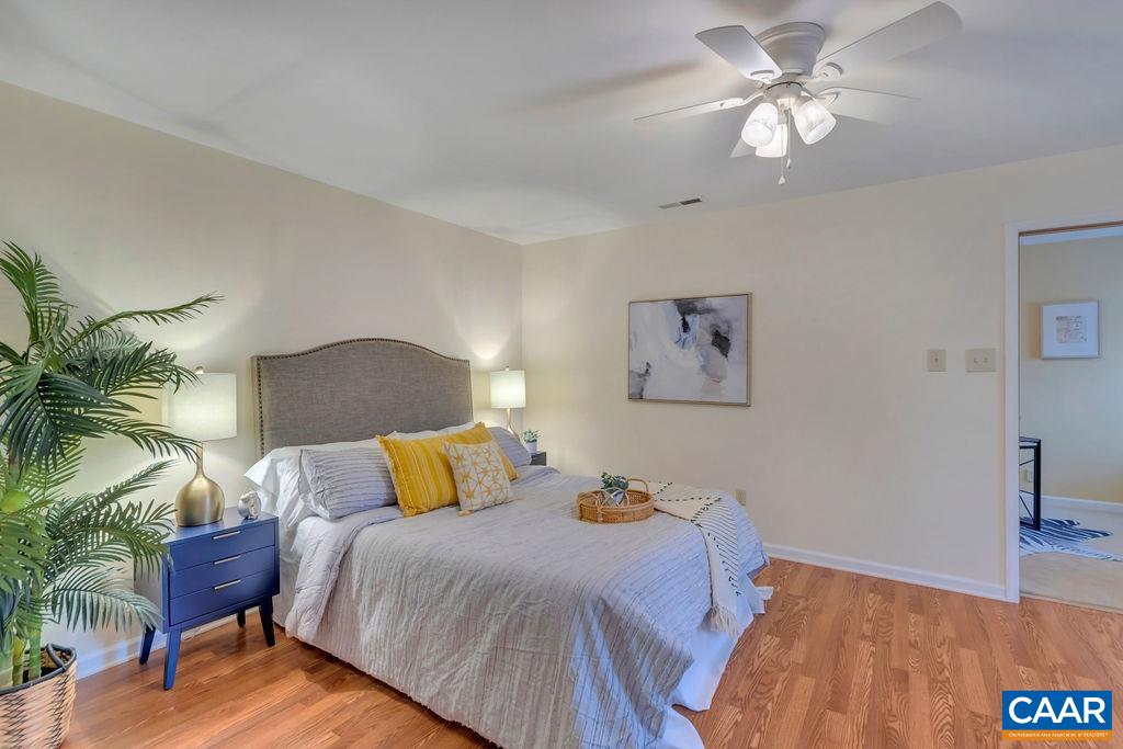 88 Rose Road Ruckersville, VA 22968 - Photo 17 of 34 a bedroom with a bed and a table
