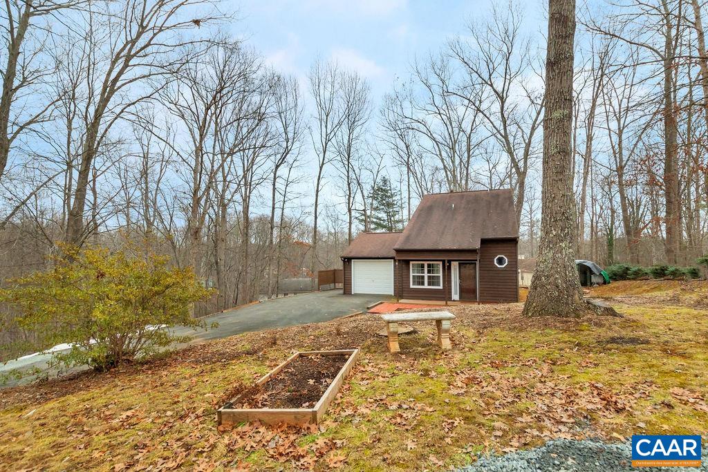 88 Rose Road Ruckersville, VA 22968 - Photo 2 of 34 a house view with a outdoor space