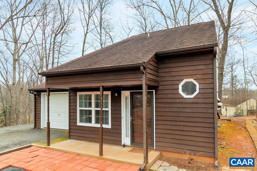 88 Rose Road Ruckersville, VA 22968 - Photo 31 of 34 a view of a house with a backyard and wooden fence