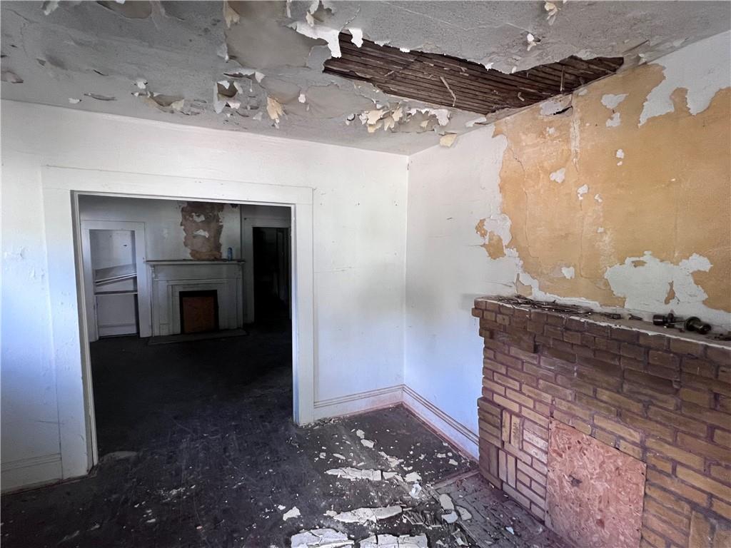 554 Nelson Street Macon, GA 31206 - Photo 26 of 37 a view of a hallway with wooden floor