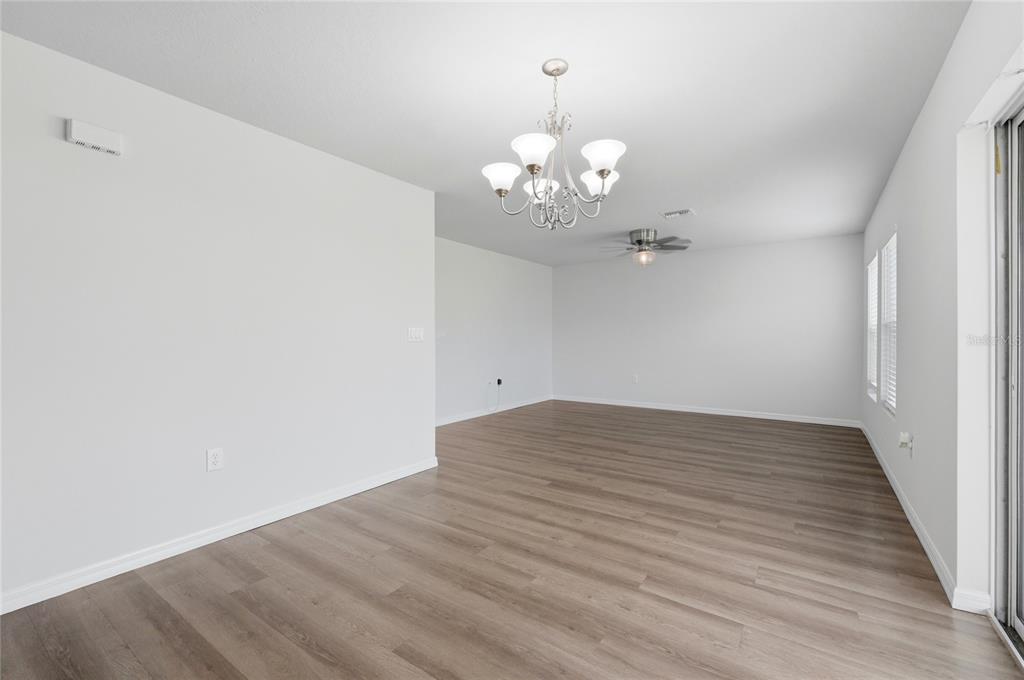 1637 Marble Street Sebring, FL 33870 - Photo 17 of 57 a view of a chandelier in a room