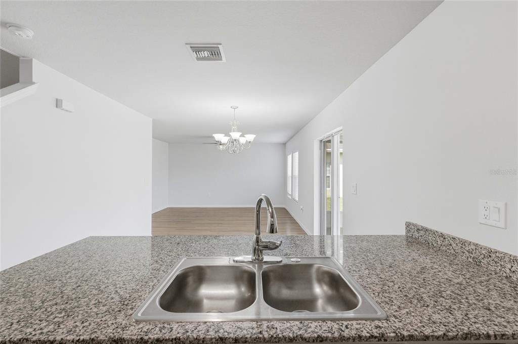 1637 Marble Street Sebring, FL 33870 - Photo 24 of 57 a bathroom with a sink and a mirror