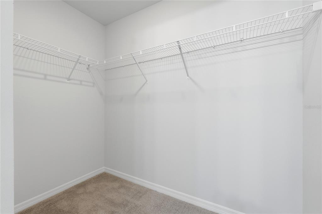 1637 Marble Street Sebring, FL 33870 - Photo 31 of 57 a view of a room with racks on the wall