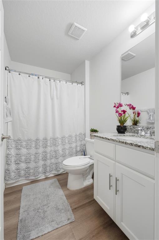 1637 Marble Street Sebring, FL 33870 - Photo 34 of 57 a bathroom with a sink toilet and shower