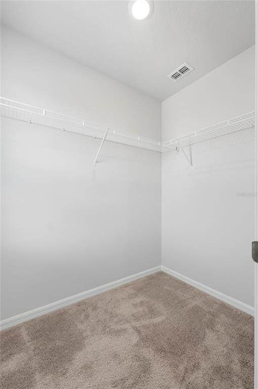 1637 Marble Street Sebring, FL 33870 - Photo 42 of 57 a view of a room with shelf on the wall