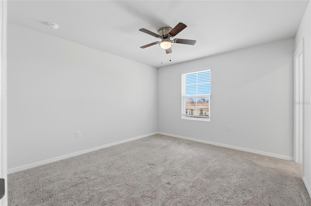 1637 Marble Street Sebring, FL 33870 - Photo 44 of 57 a view of a ceiling fan with wooden floor