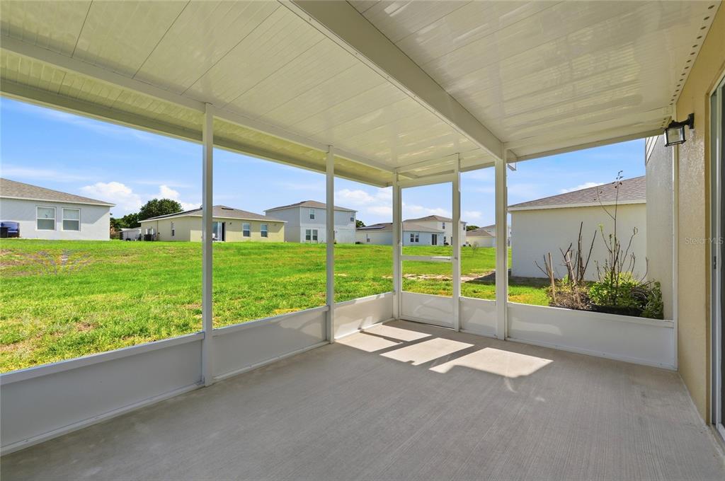 1637 Marble Street Sebring, FL 33870 - Photo 48 of 57 a view of a road with a big yard