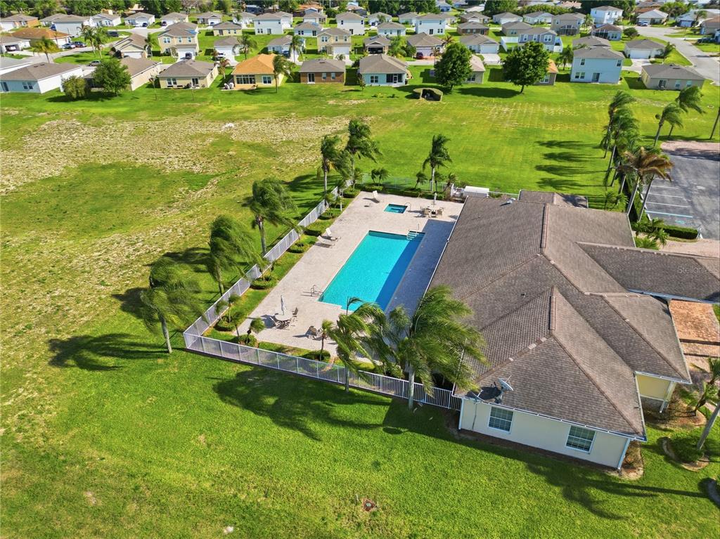 1637 Marble Street Sebring, FL 33870 - Photo 50 of 57 an aerial view of a houses with a yard